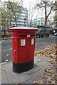 TQ3081 : Postbox on Red Lion Square, Camden, London by Ian S