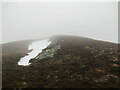 NN8773 : Snowdrift remnant in a hollow on Beinn Mheadhonach by Alan O'Dowd