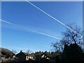 NY9363 : Contrails in the sky above Loughbrow Park by Oliver Dixon