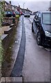 ST3090 : Black strip on the Laurel Crescent pavement, Malpas, Newport by Jaggery