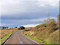 ND1838 : Power Lines Crossing the A9 near Crofts of Benachielt by David Dixon