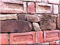 SP3875 : Detail of Brandon Marsh geology wall: Kenilworth sandstone with bricks from mudstone by A J Paxton