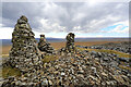 NY8732 : The stone men on Church Bowers by Andy Waddington