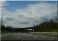 SK0705 : M6 Toll northbound: passing under the A461 at an acute angle by Christopher Hilton