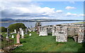 NH6465 : Burial enclosures, Cullicudden kirkyard by Bill Harrison