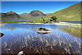 NN2141 : Small boat for fishing on Loch Dochard by Andy Waddington