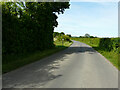 TR0339 : Footpath fingerpost, Cheesemans Green Lane by John Baker