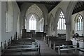 TL7772 : Interior of All Saints church by Philip Halling