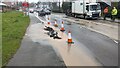 SJ5307 : Burst water main (again) on the A458 in Cross Houses by TCExplorer