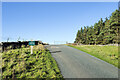 NZ0606 : Cattle grid ahead on road, and curious notice. by Trevor Littlewood