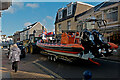 SS5147 : A Humber seafari rib boat with two Suzuki 625 outboard motors towed through Ilfracombe by a John Deere tractor by Roger A Smith