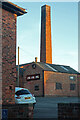 SK2919 : Two chimneys in Swadlincote by Chris Allen