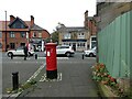 NZ2468 : Postbox and Pub by Gerald England