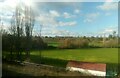 TL6904 : Sports field and pavilion from the railway by Christopher Hilton