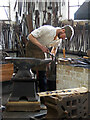 SK2625 : Claymills Victorian Pumping Station - blacksmith at work by Chris Allen