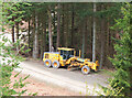 NT3734 : Road grader, Elibank & Traquair Forest by Jim Barton