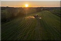 SJ5307 : Crop spraying at Sunset by TCExplorer