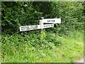 SP7255 : Fingerpost, Milton Rd, outside Gayton Marina by Mr Red