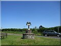 TL7799 : Village  name  sign  at  road  junction.  Foulden by Martin Dawes