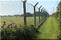 SR9496 : Path by Merrion Camp fence by M J Roscoe