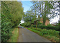 TL6954 : Cottages at Thrift Farm by John Sutton