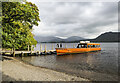 NY2519 : Ferry at landing stage by Trevor Littlewood