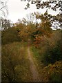 TG3227 : Southeasterly view of Weavers Way from former railway bridge by David Pashley