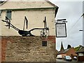 SK4524 : The sign of The Plough Inn and a plough by David Lally