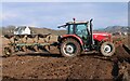 NS1848 : Tractor and plough by Richard Sutcliffe