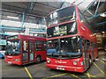 TQ4585 : Two preserved Stagecoach buses inside Barking Bus Garage by David Hillas