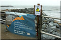 SY4590 : Explaining the outfall, West Bay by Derek Harper