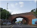 SU9950 : Railway bridge over A322, Guildford by David Smith