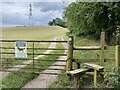 SO9665 : Stile and footpath to pylon by Mike Dodman