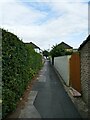 SE2937 : Path through the Carr Manor estate by Stephen Craven