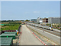 TL4554 : A Thameslink train and the Cambridge South building site by John Sutton