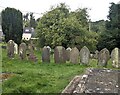 SO4910 : Headstones and trees, Mitchel Troy, Monmouthshire by Jaggery