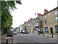 NY9939 : Looking along Front Street in Stanhope by Robert Graham