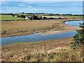 NU2410 : Creek off the Aln estuary and Waterside House by Oliver Dixon