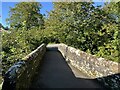 NY3239 : Bridge over the Cald Beck by Adrian Taylor