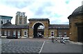 TQ3780 : Gate to Quadrangle Stores, West India Dock by Rod Grealish