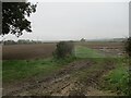 TA1544 : Field  edge  footpath  to  East  Field  Farm  through  metal  gate by Martin Dawes