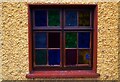 N5574 : Former bar - multicoloured window (3), Drumone, Co. Meath by P L Chadwick