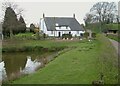 SX9487 : Pond and farmhouse, Towsington by Derek Harper