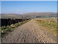 SD8589 : The Old Cam Road with Staggs Fell in background by John Watson