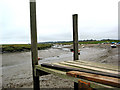 TG0044 : Low tide, Morston Quay towards church at Blakeney by Pauline E