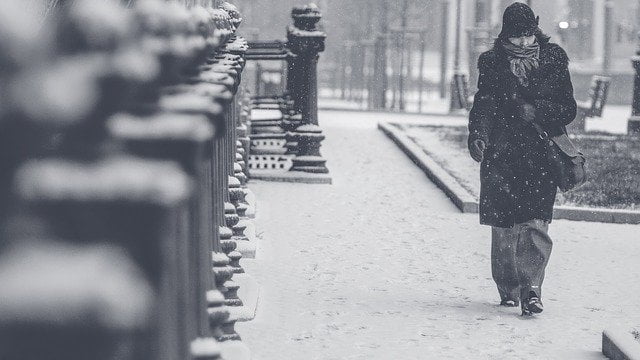 Person walking through the snow.