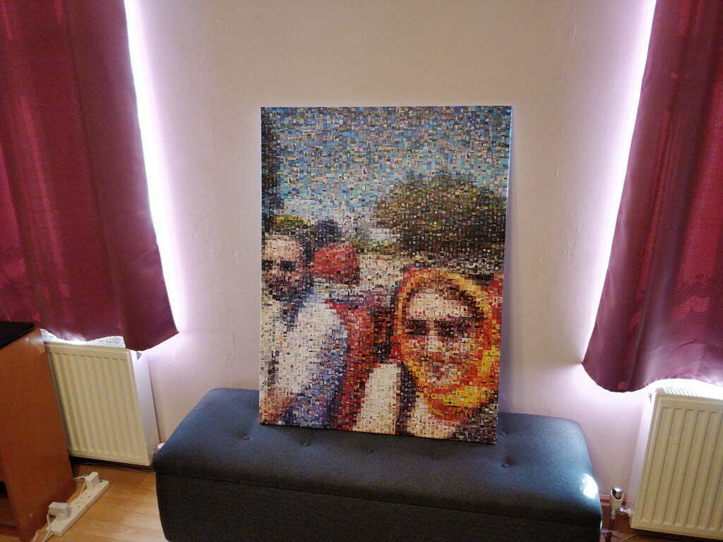 A large canvas print of a photo of me and Liz in a top-down car. On closer inspection, the print is made up of lots of smaller prints.