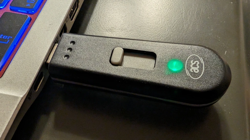 USB thumb drive plugged into a computer.