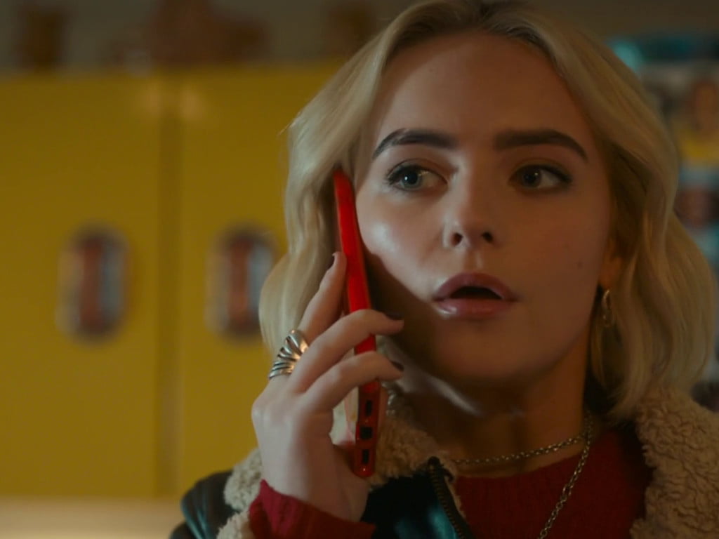 Ruby holding a phone.