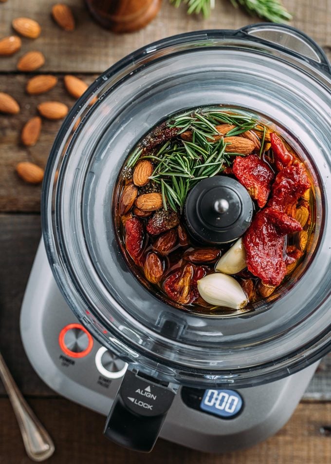 sun-dried tomato pesto ingredients in a food processor